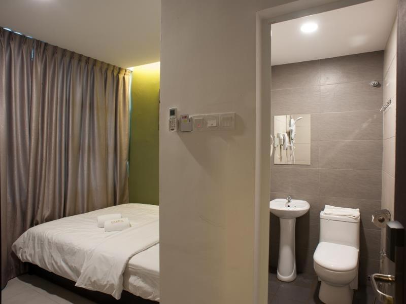 Econtel Queensbay Sungai Dua Bukit Екстериор снимка