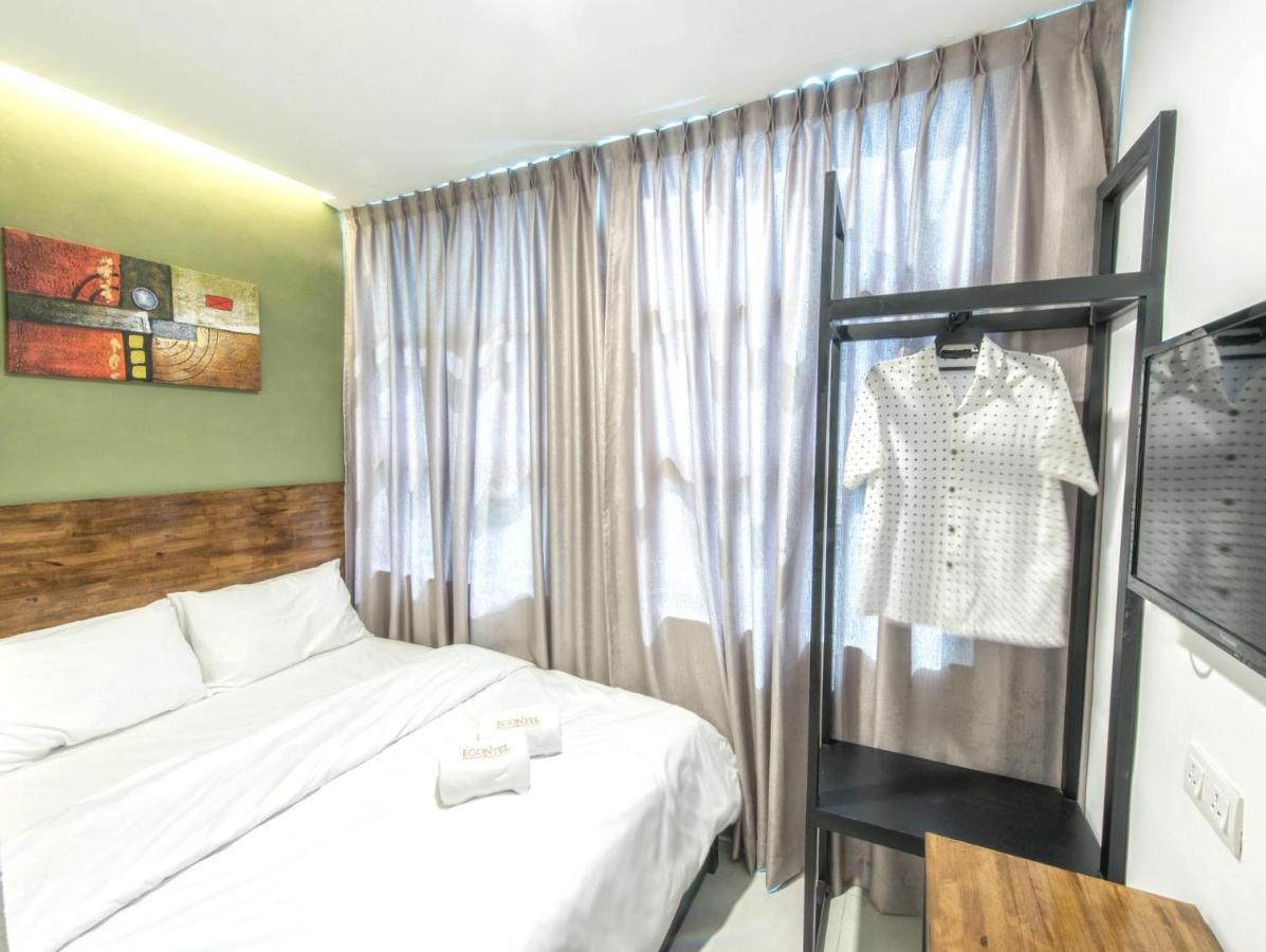 Econtel Queensbay Sungai Dua Bukit Екстериор снимка
