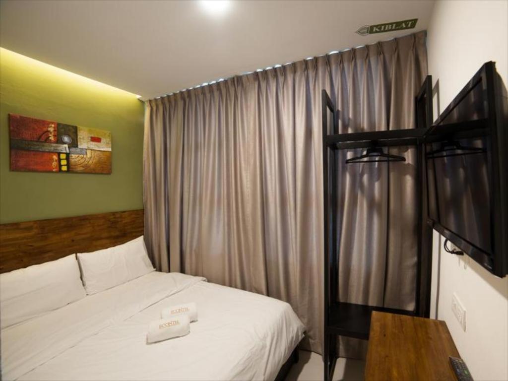 Econtel Queensbay Sungai Dua Bukit Екстериор снимка